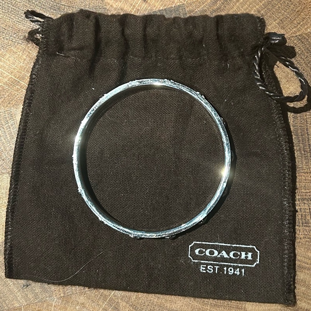 Coach bangle - black and silver stars